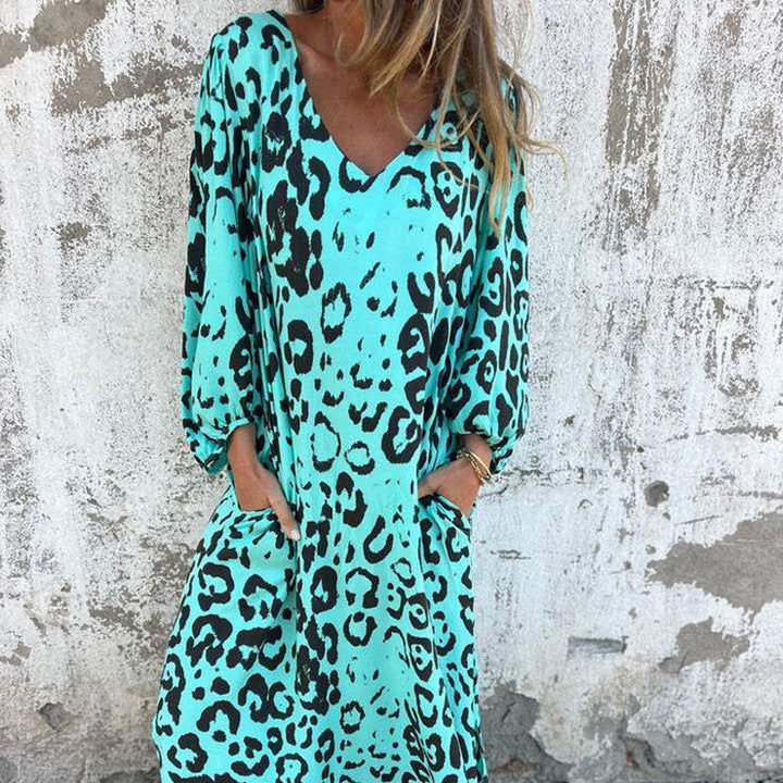 JOLY | Robe fluide avec décolleté en V et poches.